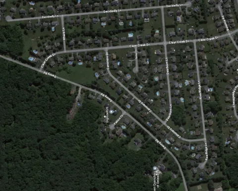 Satellite map of the Clear Creek neighborhood showing Clear Creek Drive, Canonero Drive, Dearborn Lane, Decidedly Lane, Khara Lane, Riva Ridge Lane and Denny Road